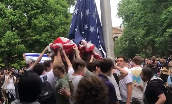 WATCH: Fraternity Members SAVE American Flag During Riot